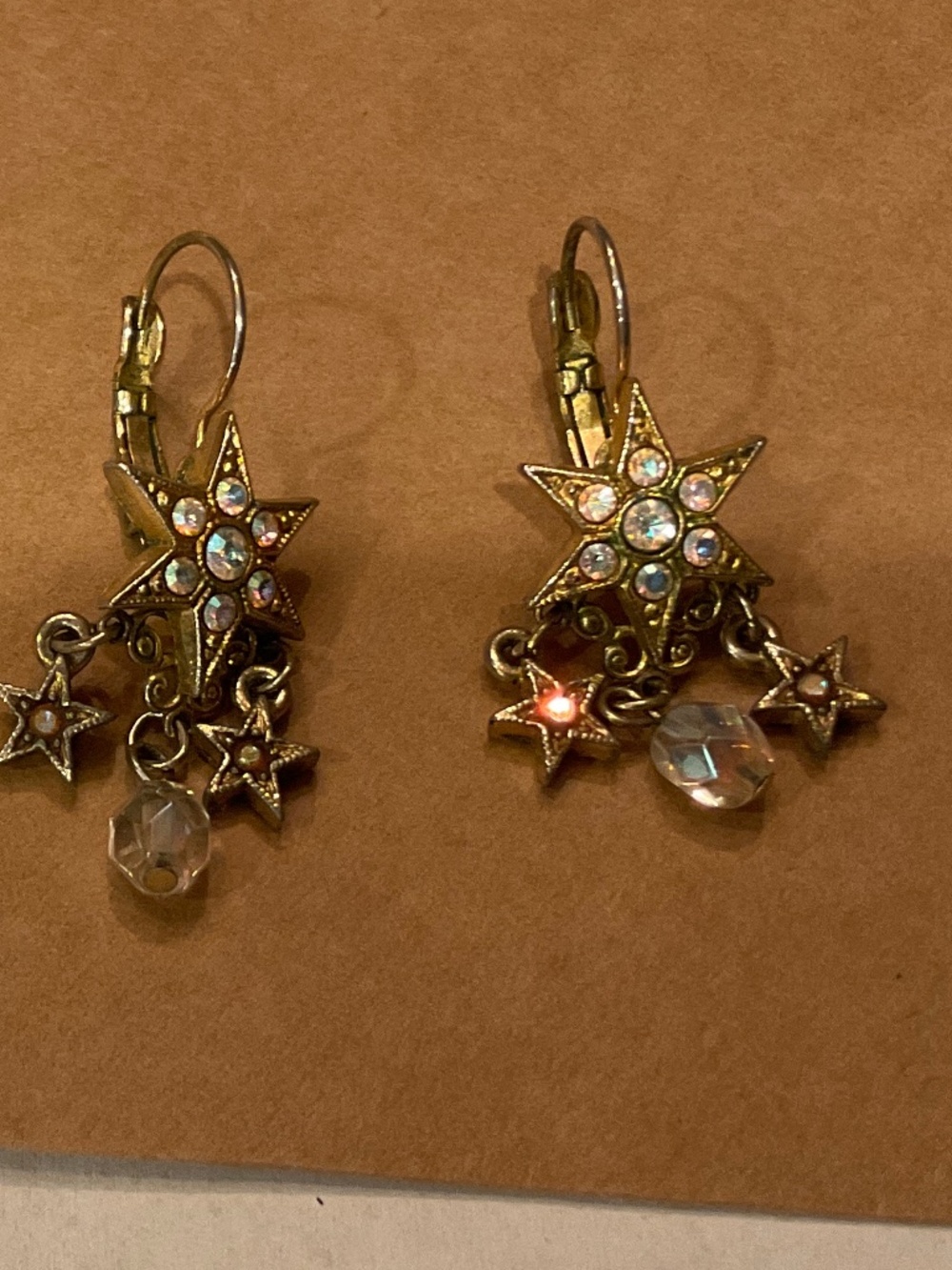 Gold tone with stars and some bling